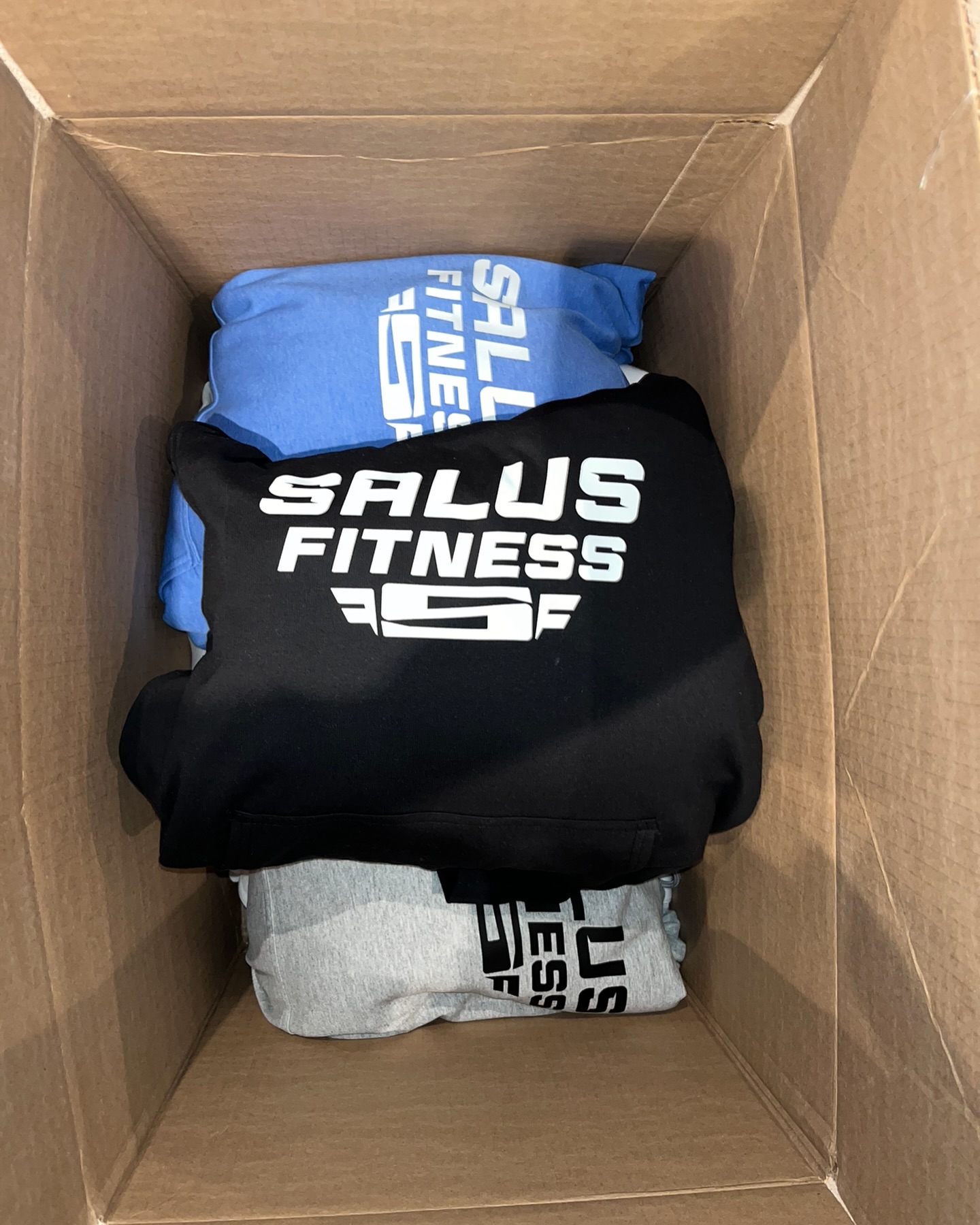 Bulk custom hoodies boxed and ready to ship
